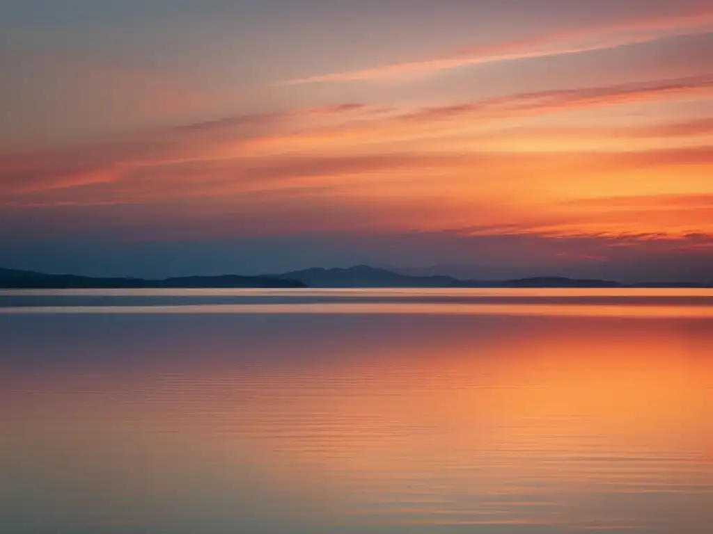 Un paisaje sereno y tranquilo con aguas calmadas reflejando un atardecer dorado y cielo pastel